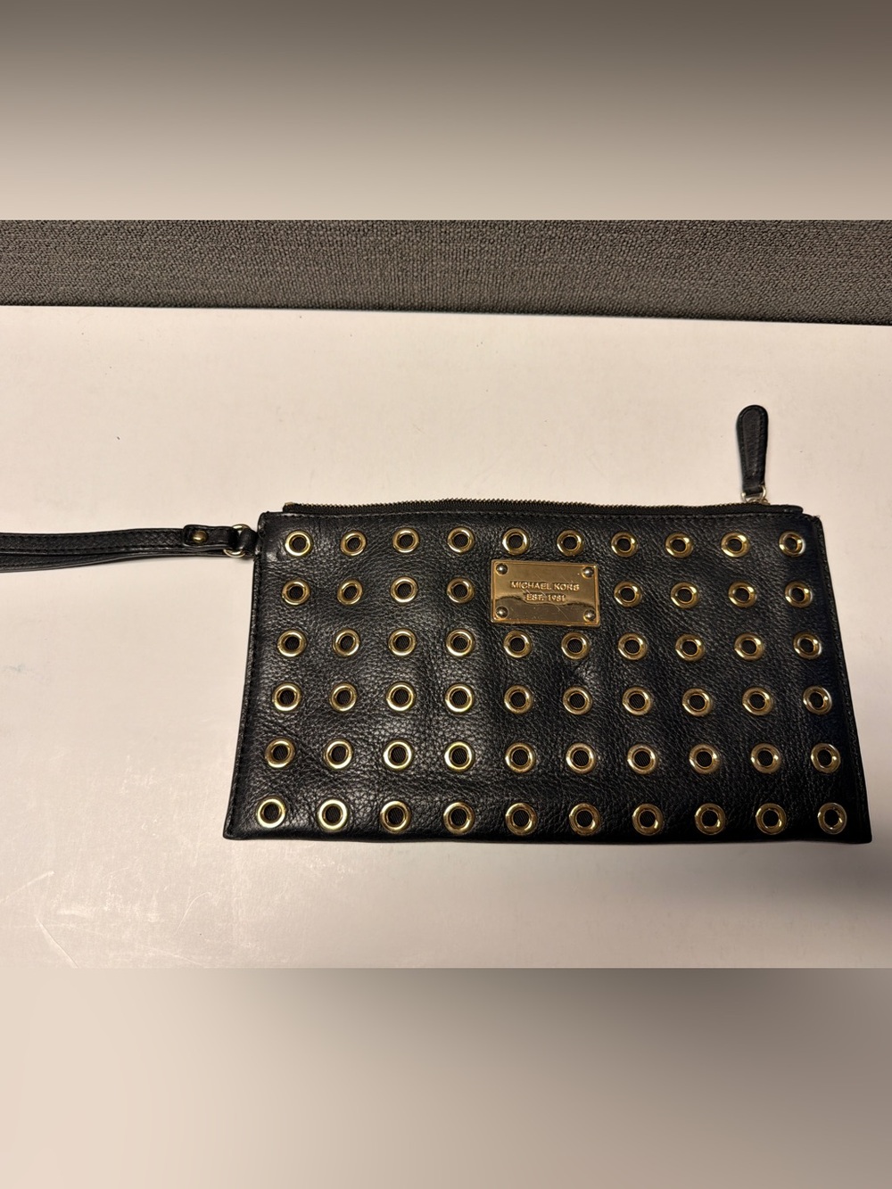 MICHAEL Michael Kors Black Leather Wristlet with Gold Grommet Details